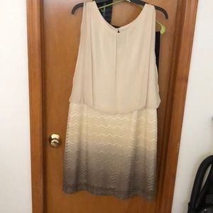 Short, knee length. Mother of the Bride’s dress